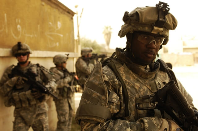（イラク戦争に派遣されたアフリカ系アメリカ人 Photo by Army.mil）